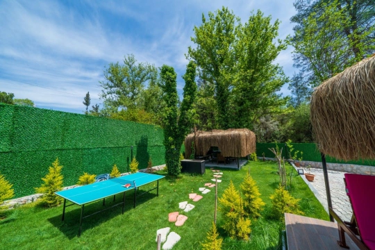 Fethiye villa ece bahçesi oturma grubu masa tenisi alanı