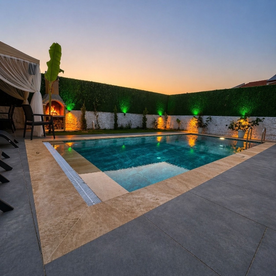 Villa Ekvator 2 Fethiye Ovacık’ta gün batımı manzaralı geniş havuz terası ve huzurlu atmosfer